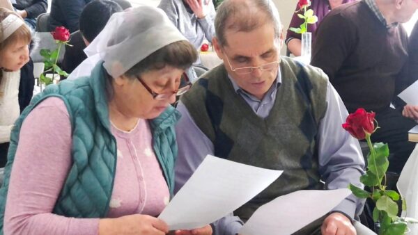 A couple works on their Marriage Course questions at a session in Congaz, Moldova, made possible by MMN donors.